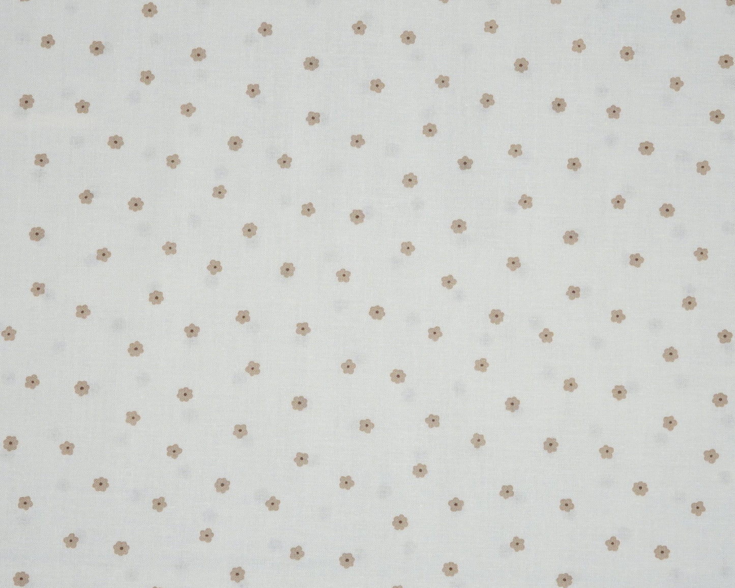 White fabric with small brown polka dots
