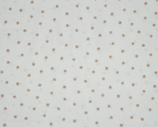 White fabric with small brown polka dots