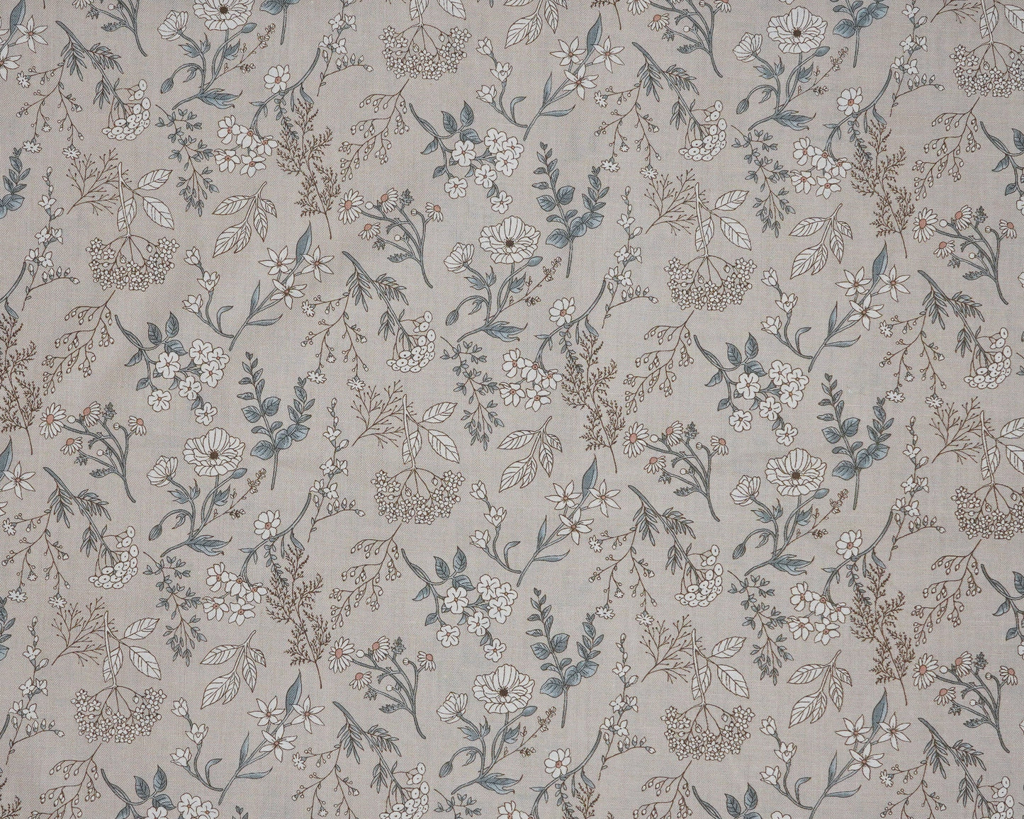 Floral patterned fabric with small flowers and leaves on a neutral background