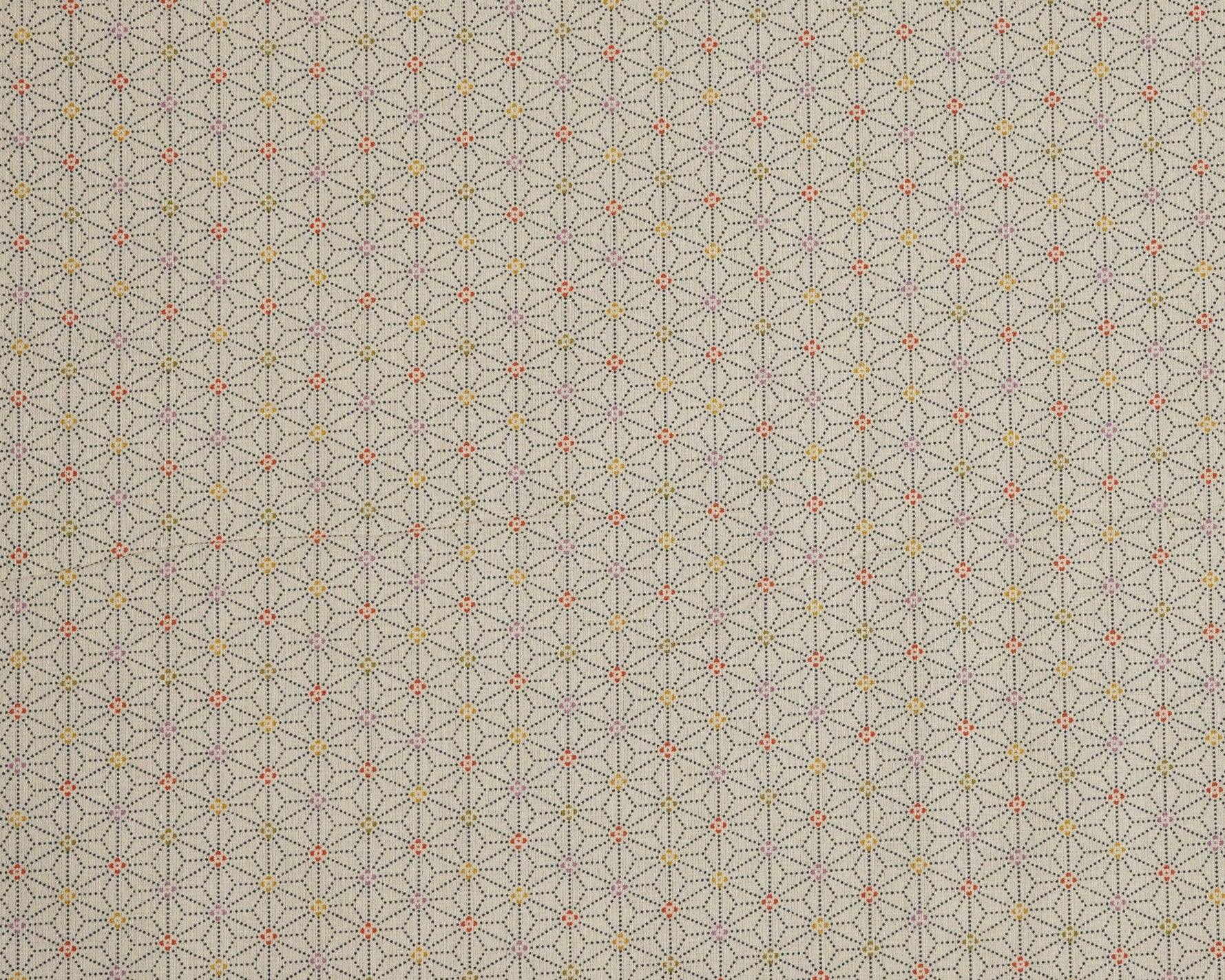 Patterned fabric with geometric design on a beige background