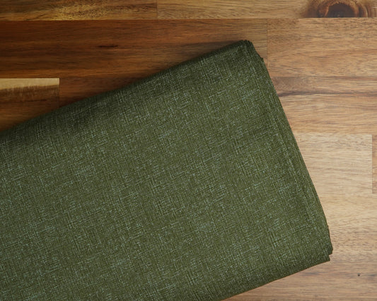 Japanese Tonal fabric in Medium Green, folded on the bolt