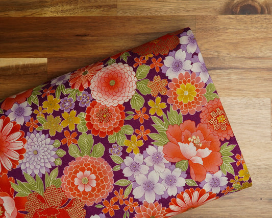 Orange and Purple Japanese Peony Metallic Floral cotton fabric, folded on the bolt