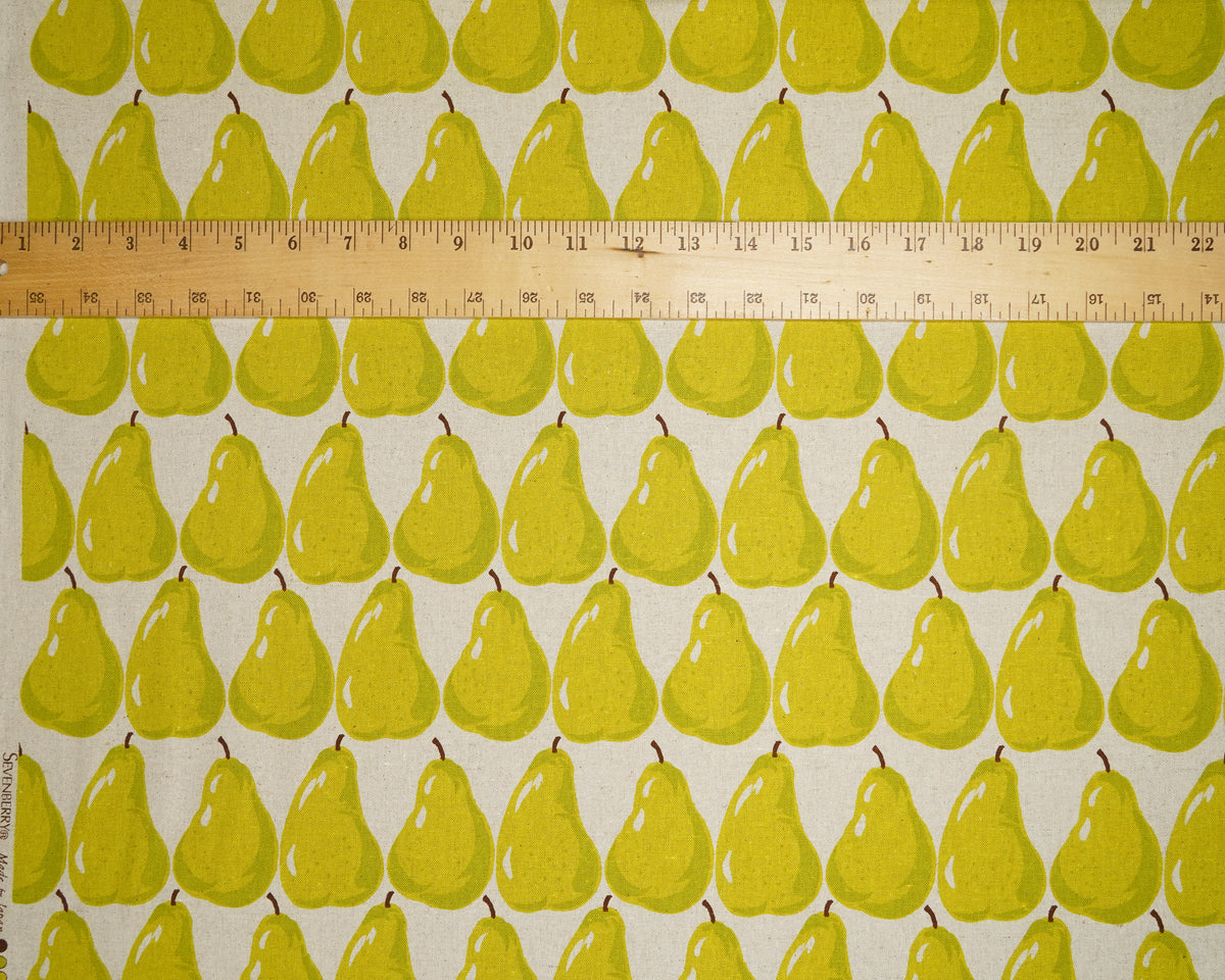 Green Pears on Natural cotton linen canvas, laid flat with a ruler for scale