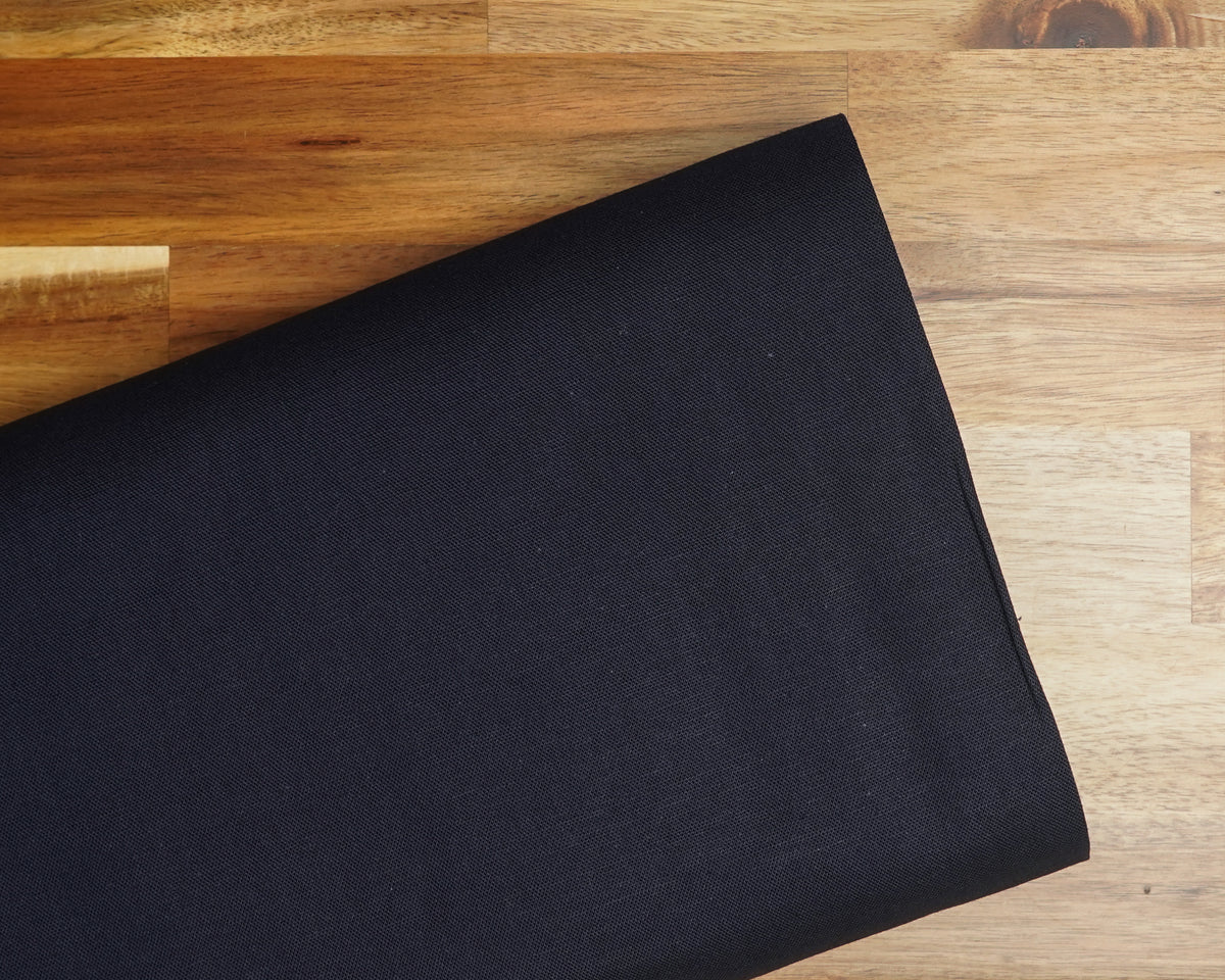 Solid Indigo cotton linen canvas, folded on the bolt