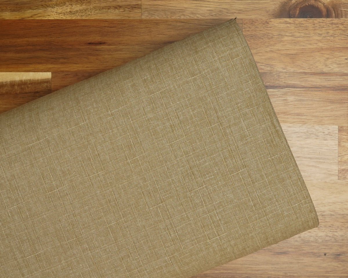 Heathered Solid Dobby fabric in Taupe, folded on the bolt