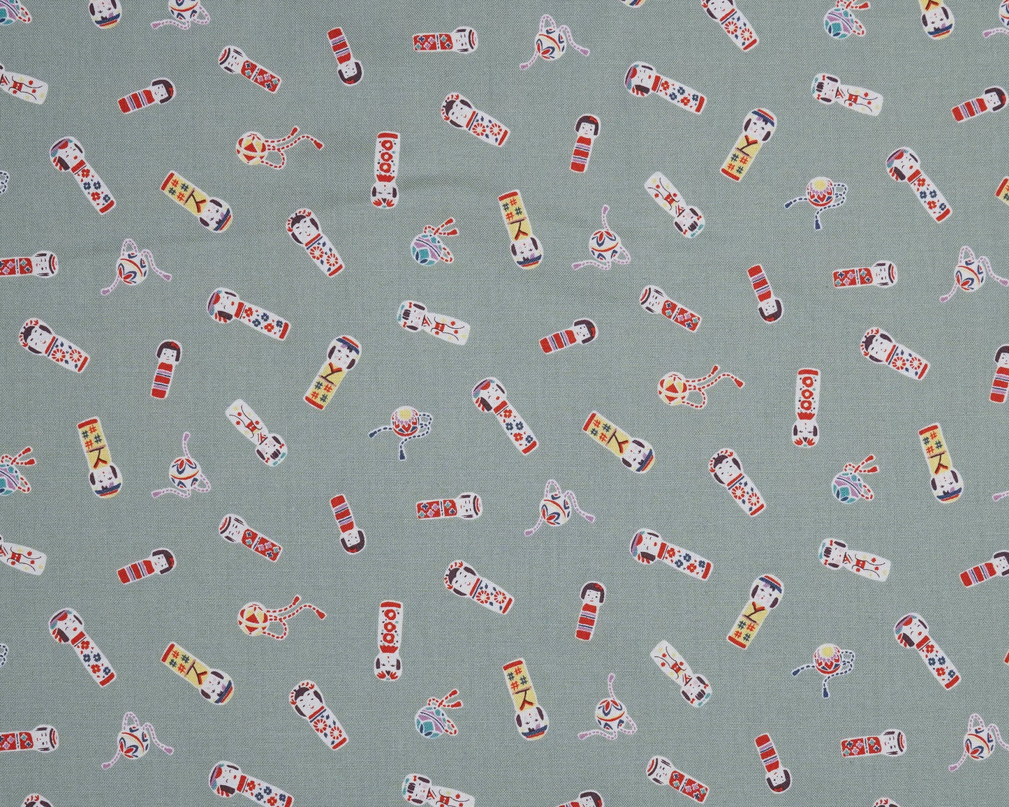Kokeshi Doll Scatter on Sage Green - Cotton Fabric - Cosmo