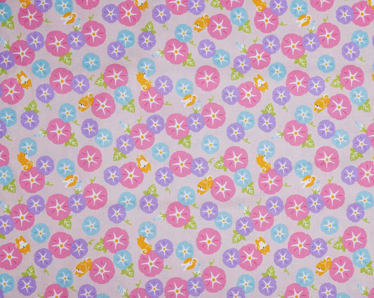 Pattern of colorful flowers on a light purple background