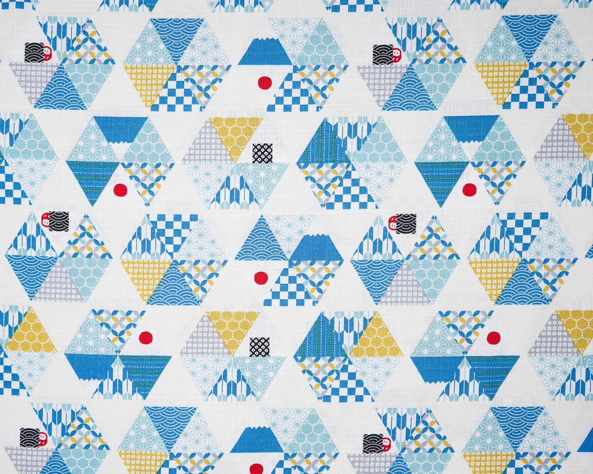 Pattern of geometric shapes in blue, yellow, and red on a white background
