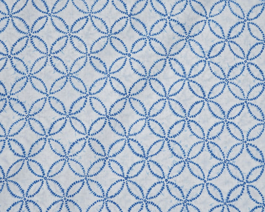 Blue circular pattern on a white background